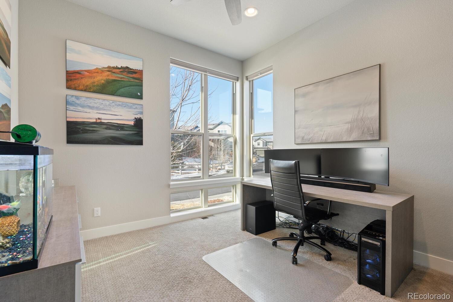 507 Red Thistle Drive Highlands Ranch, CO 80126 - Photo 12 of 42 a view of a workspace with furniture and a window