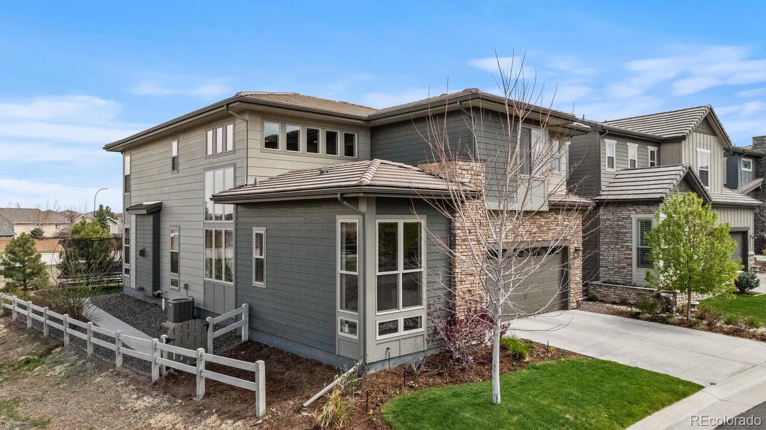 507 Red Thistle Drive Highlands Ranch, CO 80126 - Photo 2 of 42 a front view of a house with plants