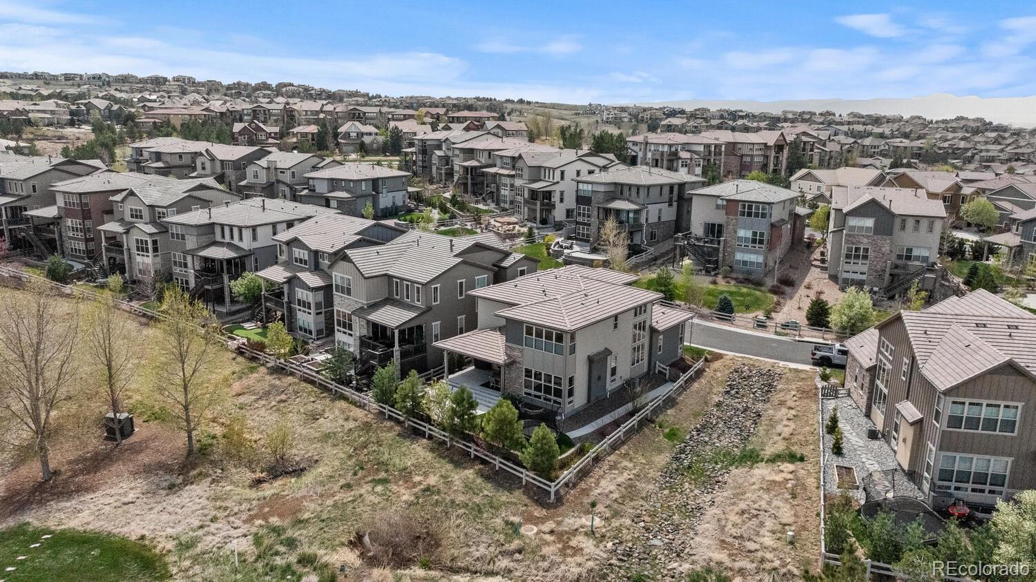 507 Red Thistle Drive Highlands Ranch, CO 80126 - Photo 37 of 42 an aerial view of a house with a yard