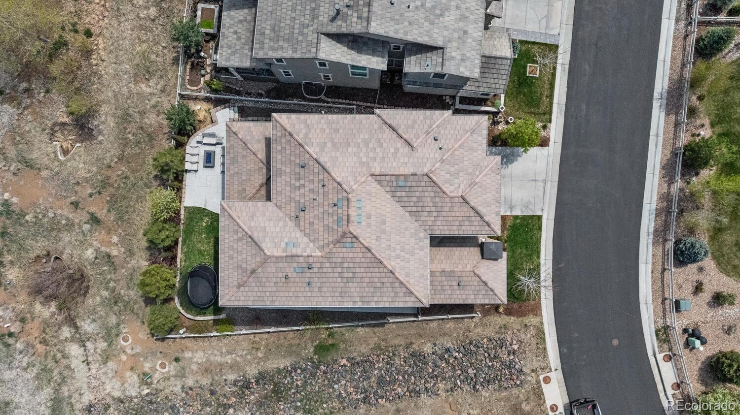 507 Red Thistle Drive Highlands Ranch, CO 80126 - Photo 38 of 42 an aerial view of a house with a yard