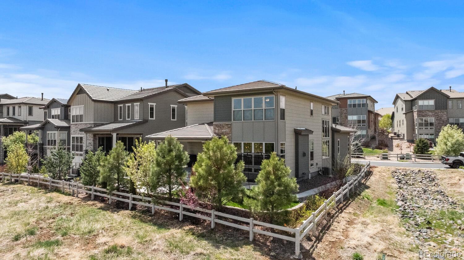507 Red Thistle Drive Highlands Ranch, CO 80126 - Photo 42 of 42 a front view of a house with a yard