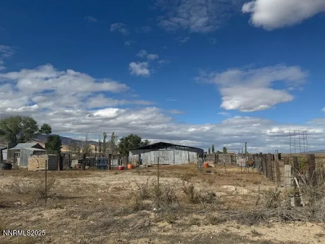 a view of a lake with a big yard
