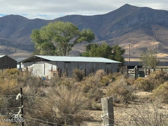 1600 Kyle Hot Springs Road Imlay, NV 89418 - Photo 14 of 45 a backyard of a house with lots of green space