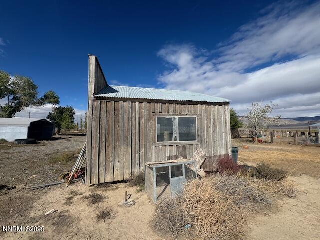1600 Kyle Hot Springs Road Imlay, NV 89418 - Photo 9 of 45 a backyard of a house with table and chairs
