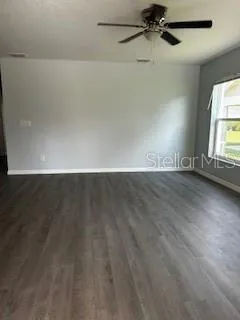 en view of an empty room with a window