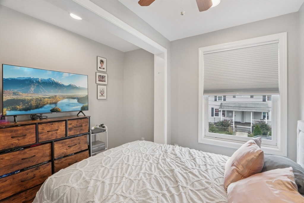 19 Delford Street, Unit 1 Boston, MA 02131 - Photo 14 of 25 a bedroom with a bed and a window