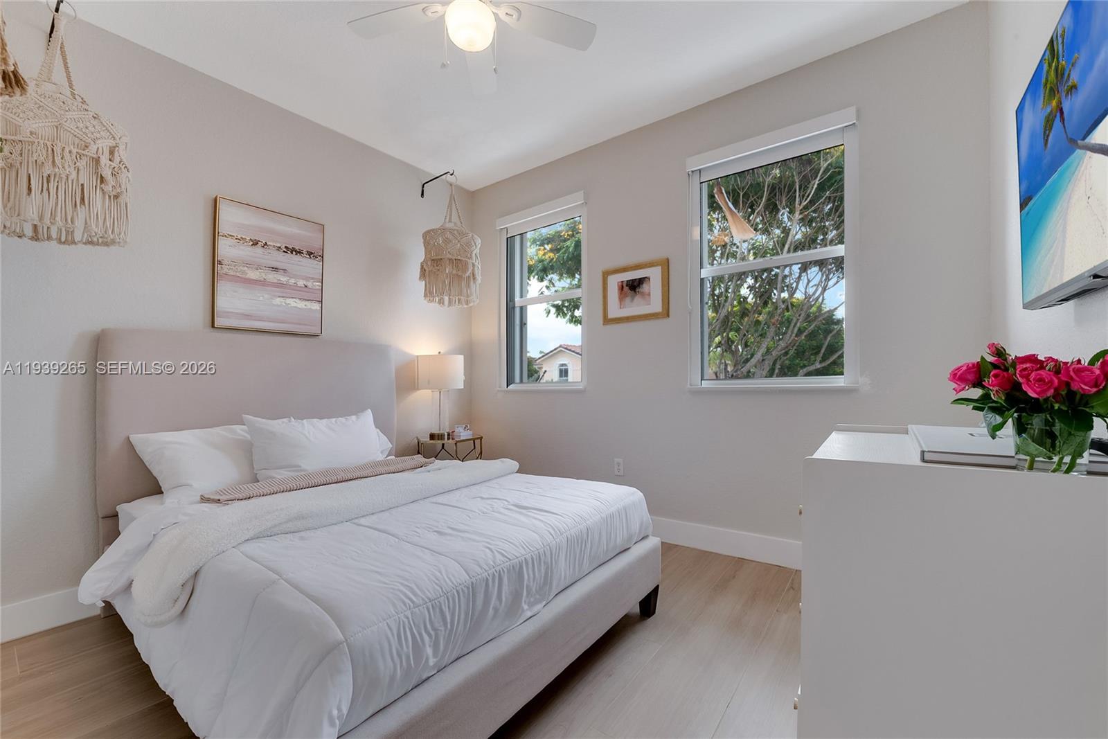 12480 Southwest 125th Terrace Miami, FL 33186 - Photo 13 of 19 a bedroom with bed and a window