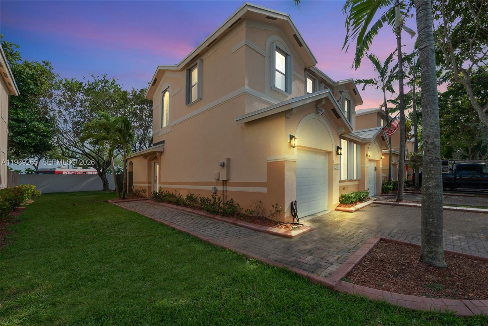 12480 Southwest 125th Terrace Miami, FL 33186 - Photo 19 of 19 a front view of a house with a yard