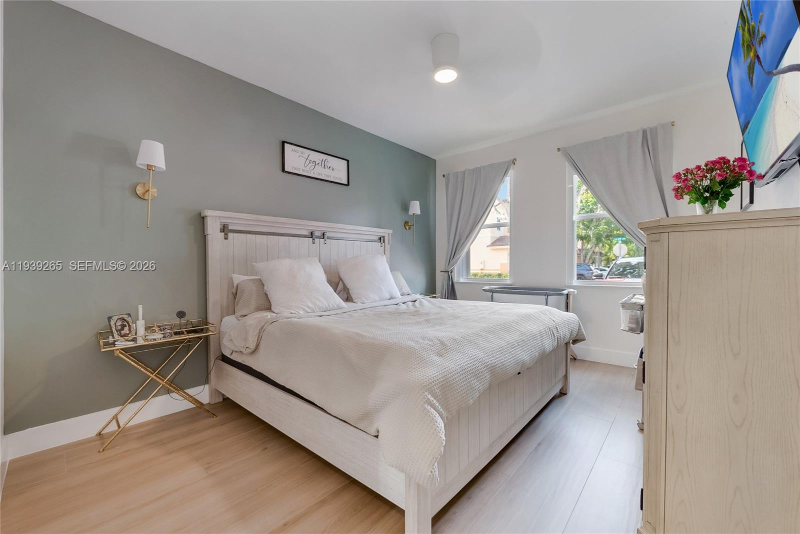 12480 Southwest 125th Terrace Miami, FL 33186 - Photo 9 of 19 a bedroom with a bed and a window