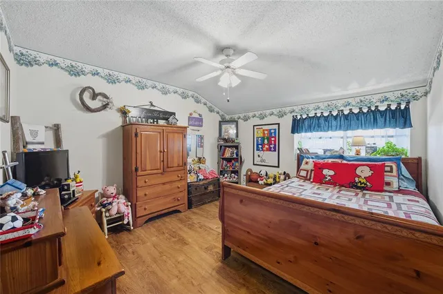 a view of a room with workspace and mirror