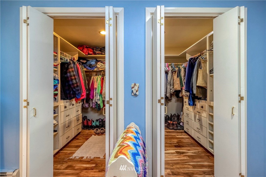 142 Barger Road Prescott, WA 99348 - Photo 17 of 40 a view of walk in closet with clothes and shoes
