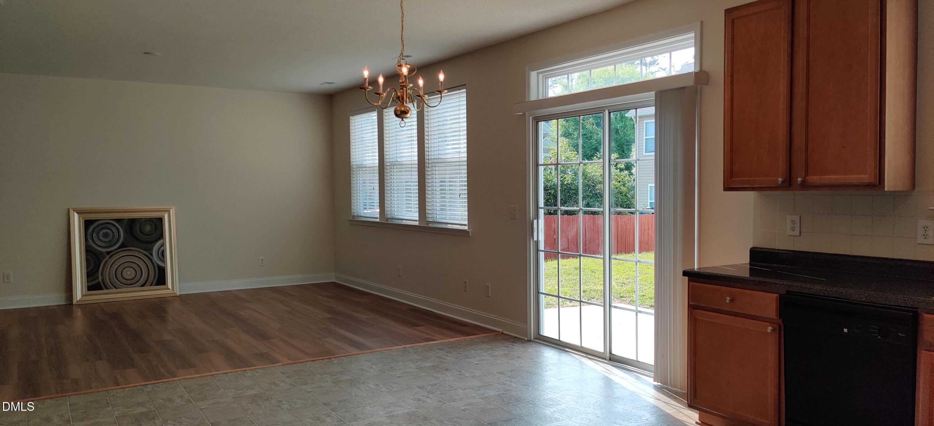 4011 Oatgrass Lane Raleigh, NC 27604 - Photo 8 of 21 a view of an empty room and window