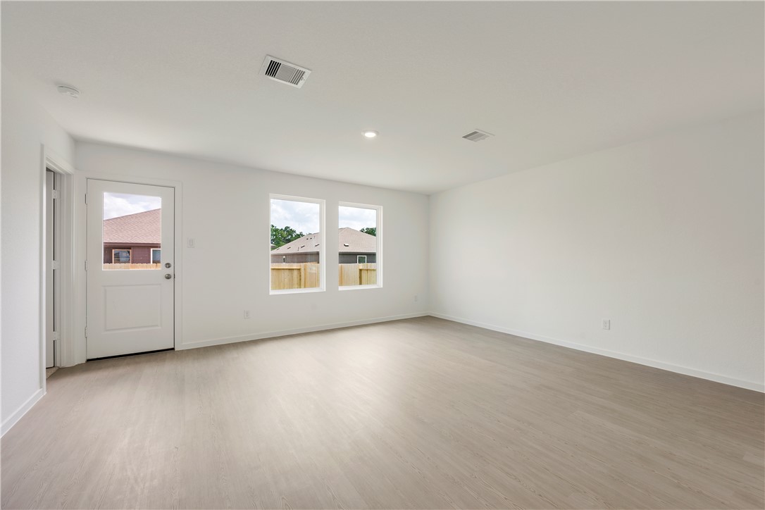 5433 Bear Run Bryan, TX 77807 - Photo 12 of 23 an empty room with windows