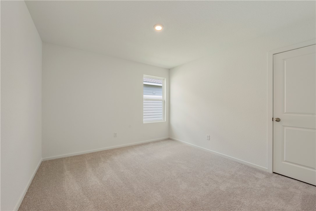 5433 Bear Run Bryan, TX 77807 - Photo 20 of 23 a view of an empty room with a window