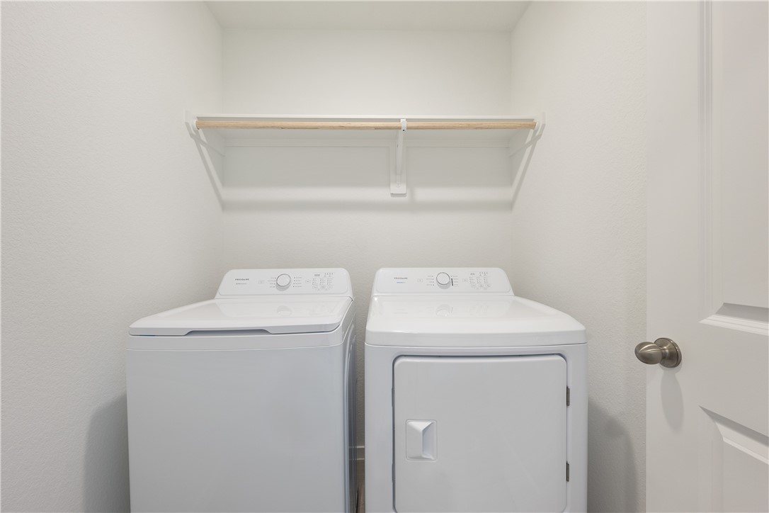 5433 Bear Run Bryan, TX 77807 - Photo 22 of 23 a utility room with dryer and washer