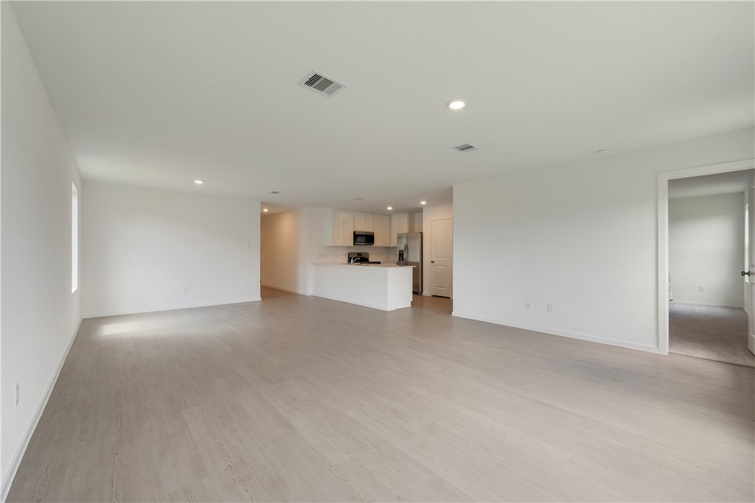 5433 Bear Run Bryan, TX 77807 - Photo 10 of 23 a view of a big room with closet and windows