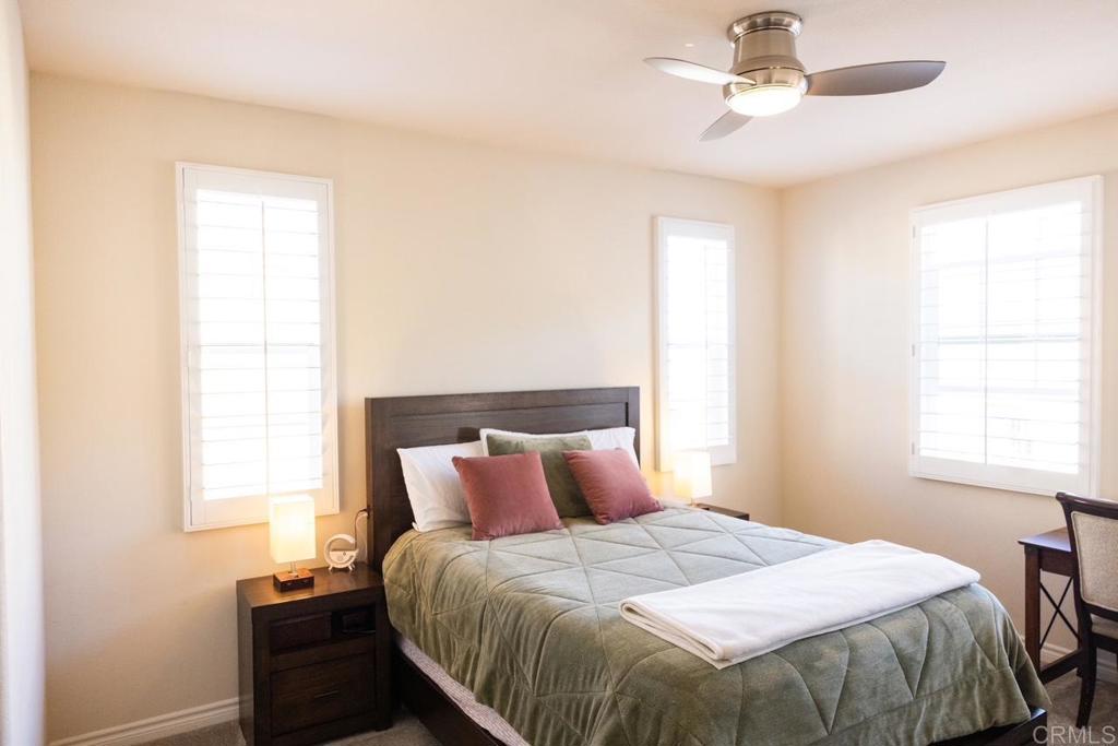 2332 Sentinel Lane San Marcos, CA 92078 - Photo 11 of 24 a bedroom with a bed and wooden floor