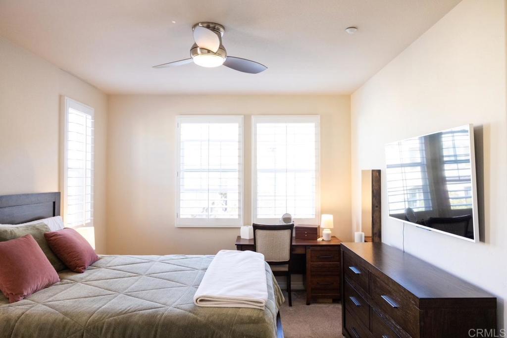 2332 Sentinel Lane San Marcos, CA 92078 - Photo 10 of 24 a bedroom with a bed and wooden floor