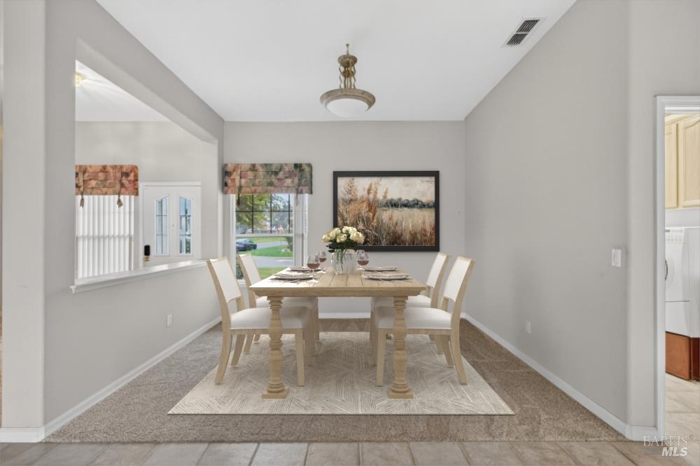 1024 Vintage Drive Rio Vista, CA 94571 - Photo 14 of 52 a dining room with wooden floor and a window