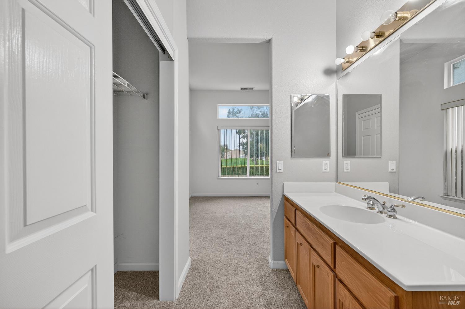 1024 Vintage Drive Rio Vista, CA 94571 - Photo 25 of 52 a bathroom with a double vanity sink a mirror and a shower