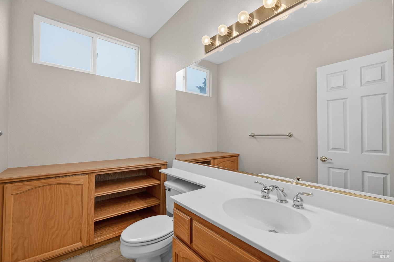 1024 Vintage Drive Rio Vista, CA 94571 - Photo 34 of 52 a bathroom with a sink a toilet and vanity