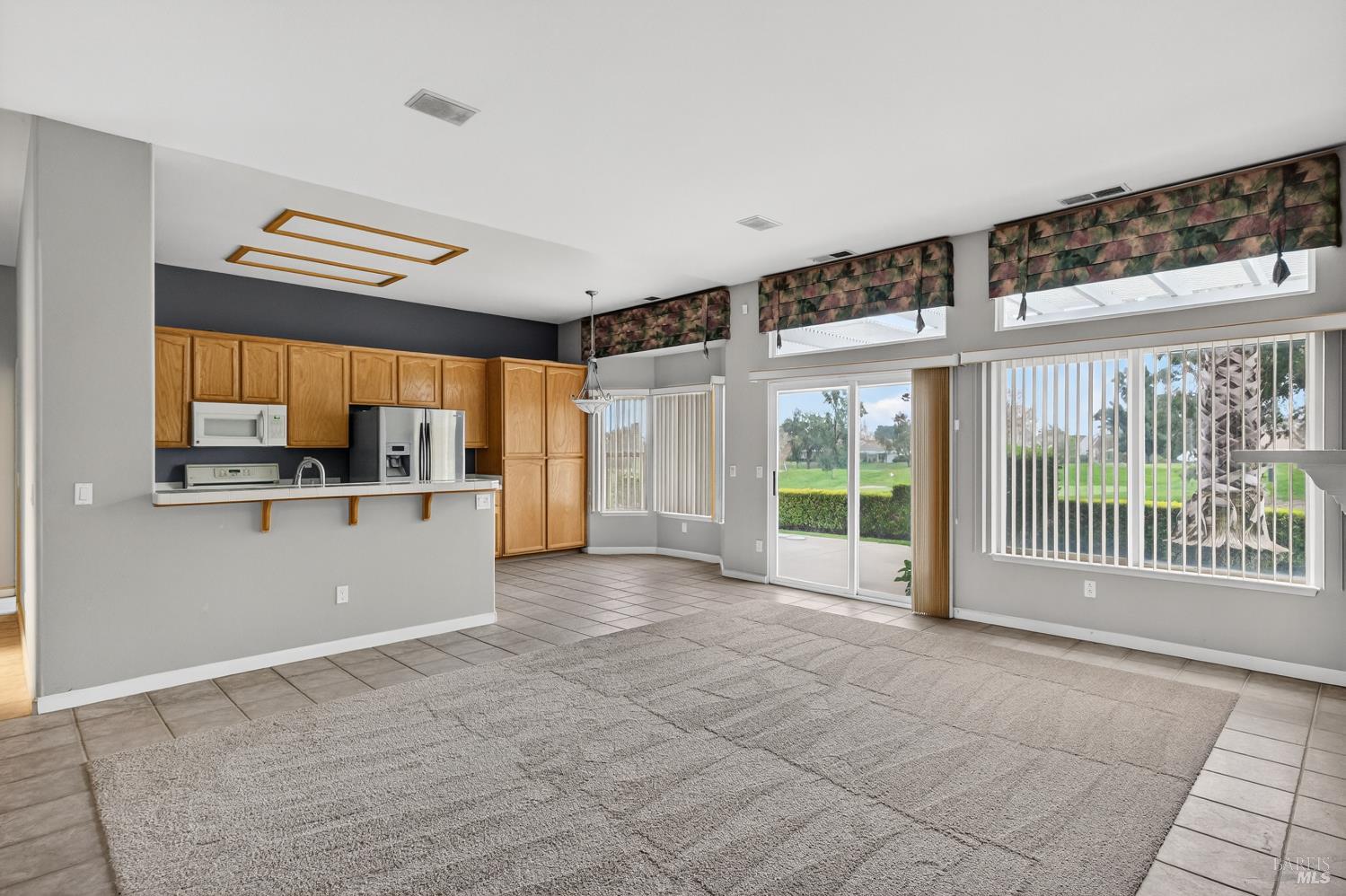 1024 Vintage Drive Rio Vista, CA 94571 - Photo 7 of 52 a view of a kitchen with a sink and a large window