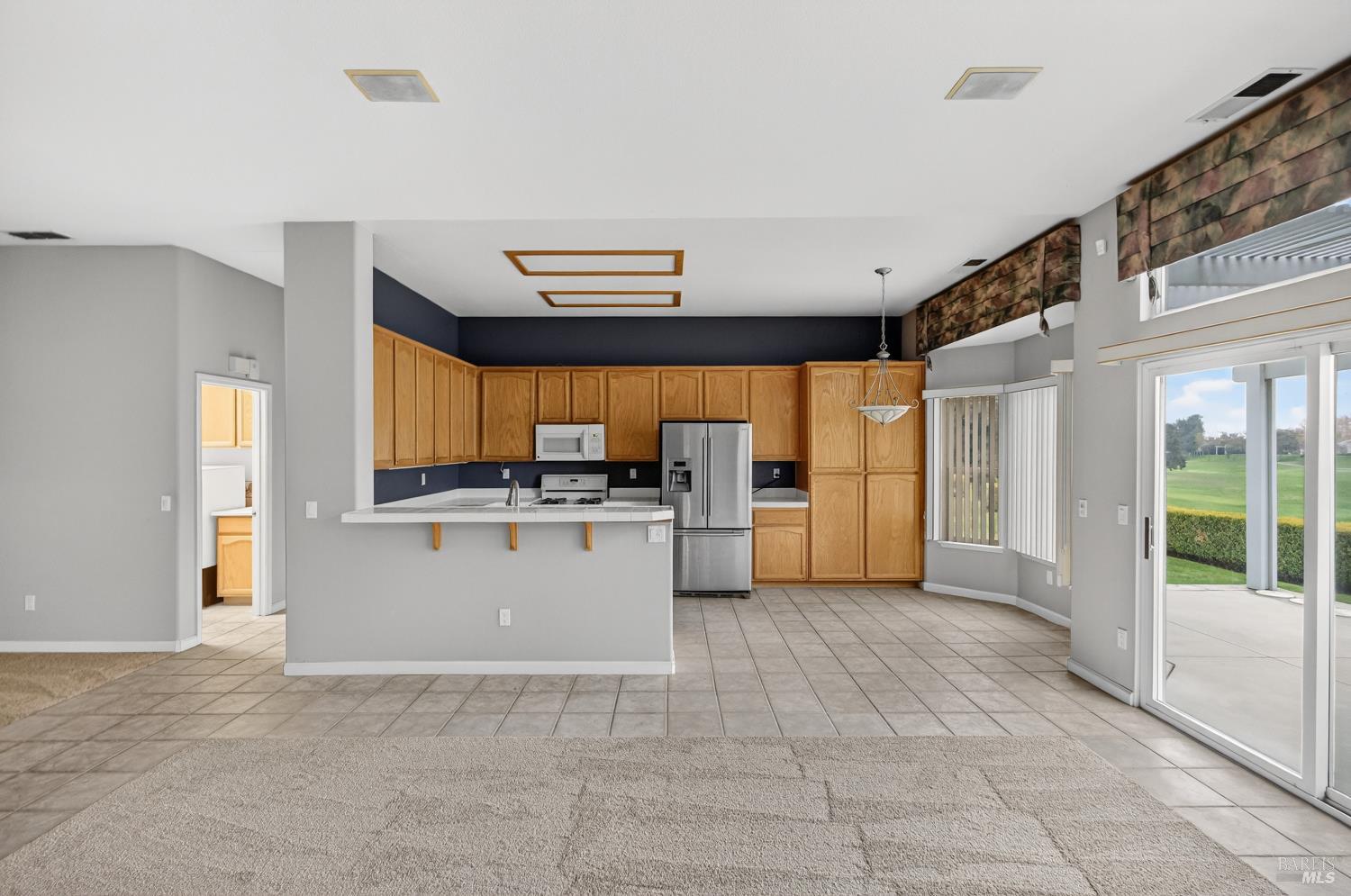 1024 Vintage Drive Rio Vista, CA 94571 - Photo 8 of 52 a view of kitchen with refrigerator and window