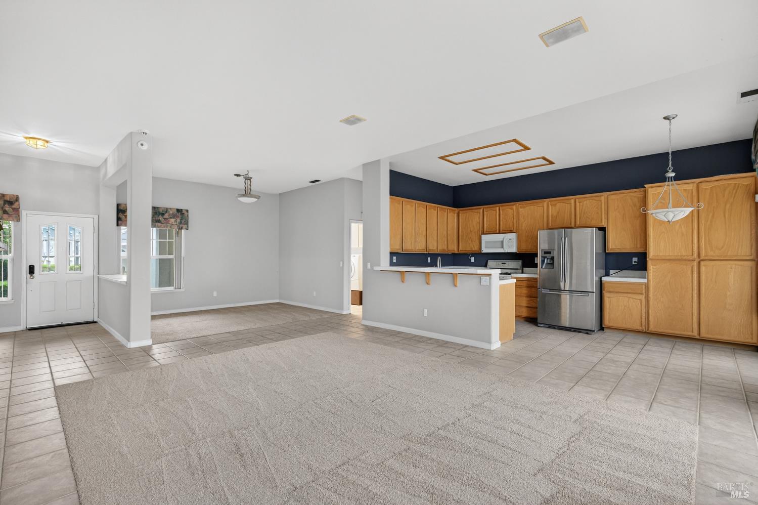 1024 Vintage Drive Rio Vista, CA 94571 - Photo 9 of 52 a view of a kitchen with a sink and dishwasher a refrigerator with wooden floor