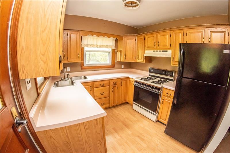 745 Wildlife Lodge Road Lower Burrell, PA 15068 - Photo 2 of 16 Kitchen offers laminate floors and gas stove (Chef's favorite)!
