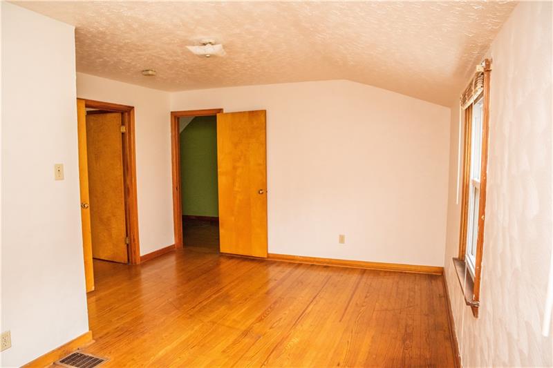 745 Wildlife Lodge Road Lower Burrell, PA 15068 - Photo 11 of 16 Gleaming hardwood throughout the 2nd level. Additional room PERFECT for 5th bedroom, office space, or kids playroom!