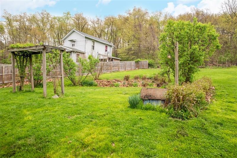 745 Wildlife Lodge Road Lower Burrell, PA 15068 - Photo 16 of 16 This pergola and flower garden area are the highlight of this backyard space!
