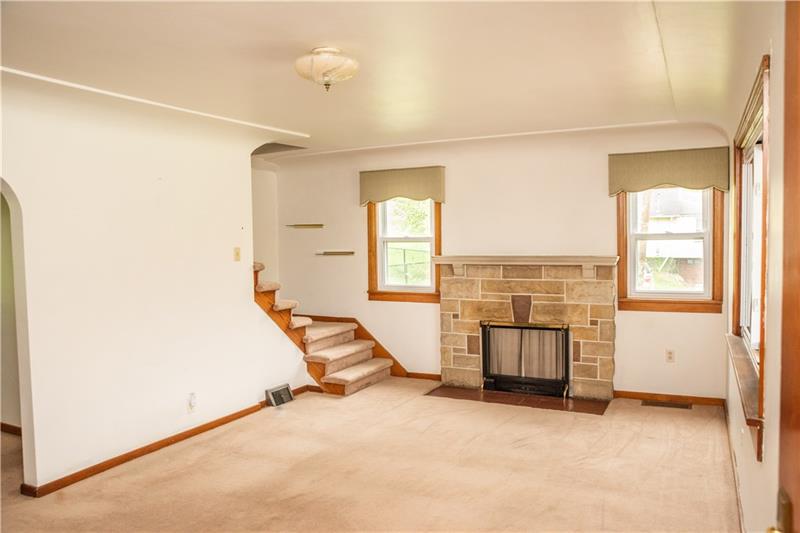 745 Wildlife Lodge Road Lower Burrell, PA 15068 - Photo 5 of 16 Stone fireplace accentuates this brightly lit room!