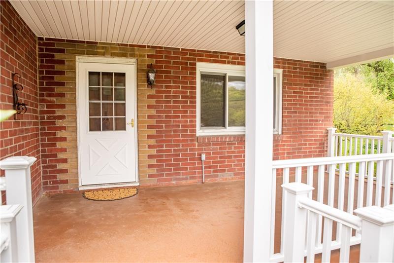 745 Wildlife Lodge Road Lower Burrell, PA 15068 - Photo 6 of 16 Newer railings on the front porch. Grab a snack and a beverage and enjoy watching a game across the street whether it be soccer or baseball!