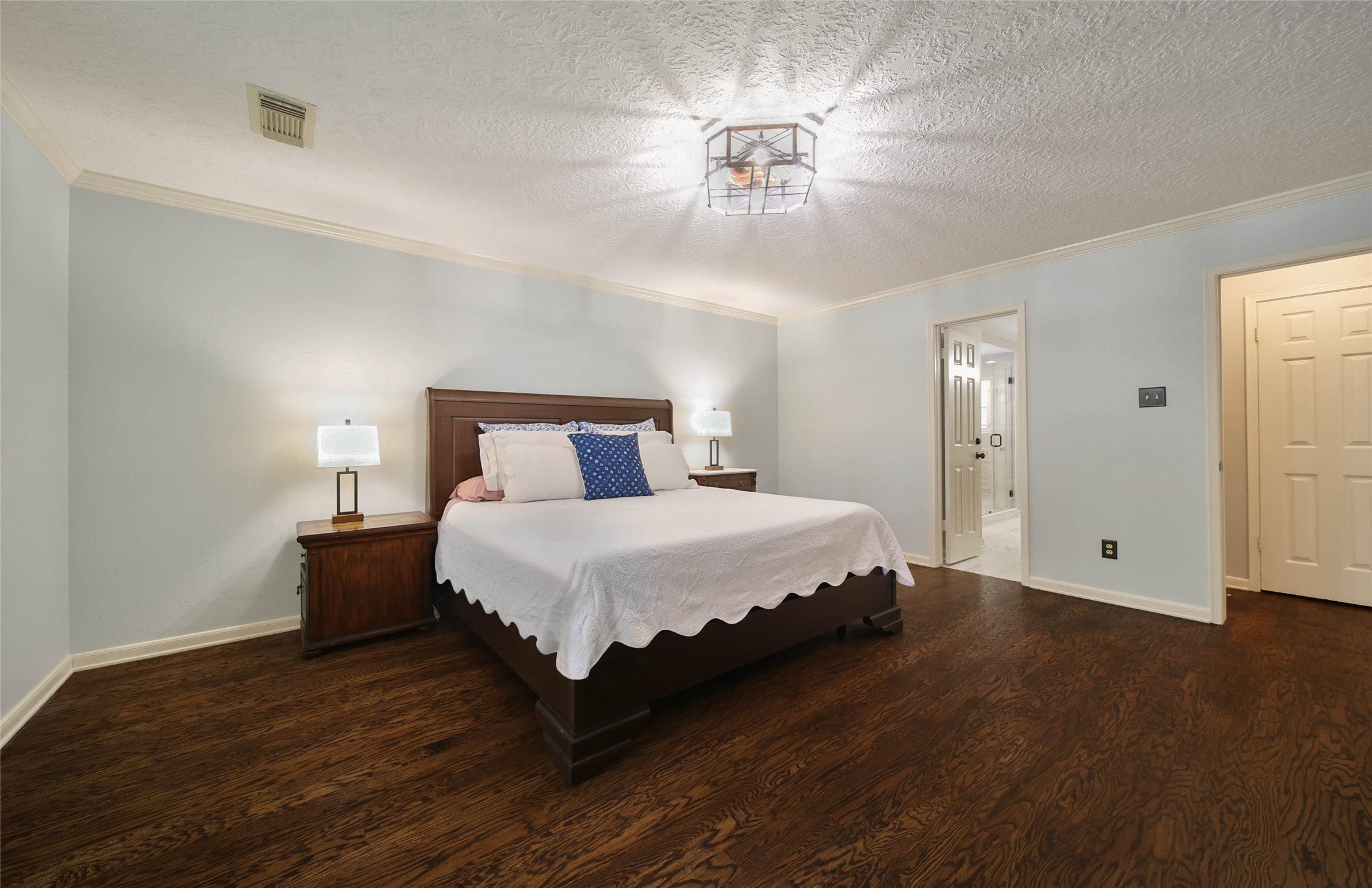 17007 Windrow Drive Spring, TX 77379 - Photo 21 of 46 a bedroom with a bed and wooden floor