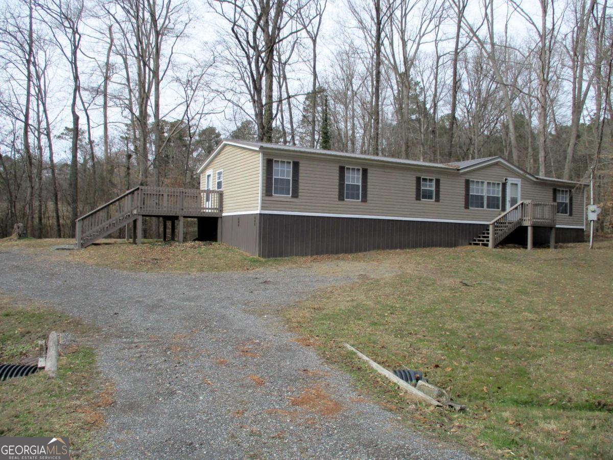 a house with trees in front of it