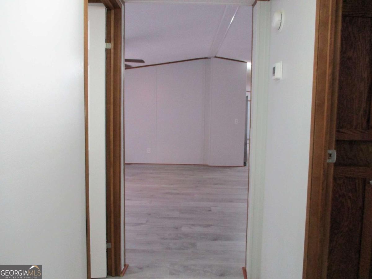 606 Cline Road Northwest Resaca, GA 30735 - Photo 4 of 49 a bathroom with a glass shower door