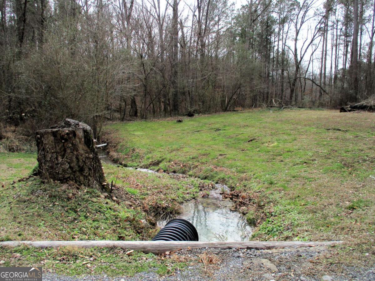 606 Cline Road Northwest Resaca, GA 30735 - Photo 44 of 49 a view of outdoor space with deck and yard