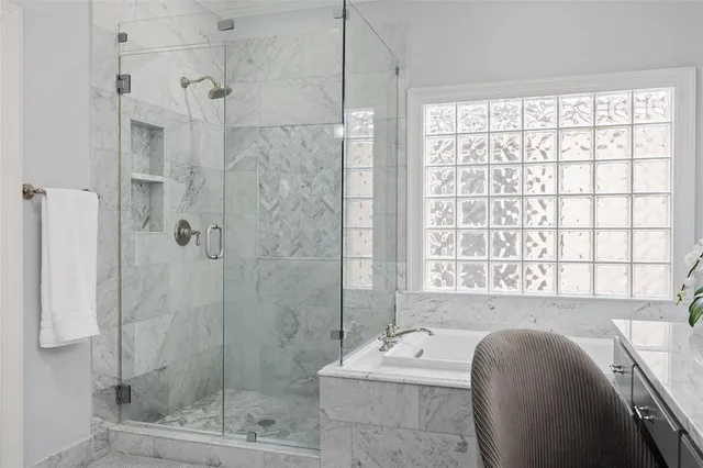 a work room with furniture and a window