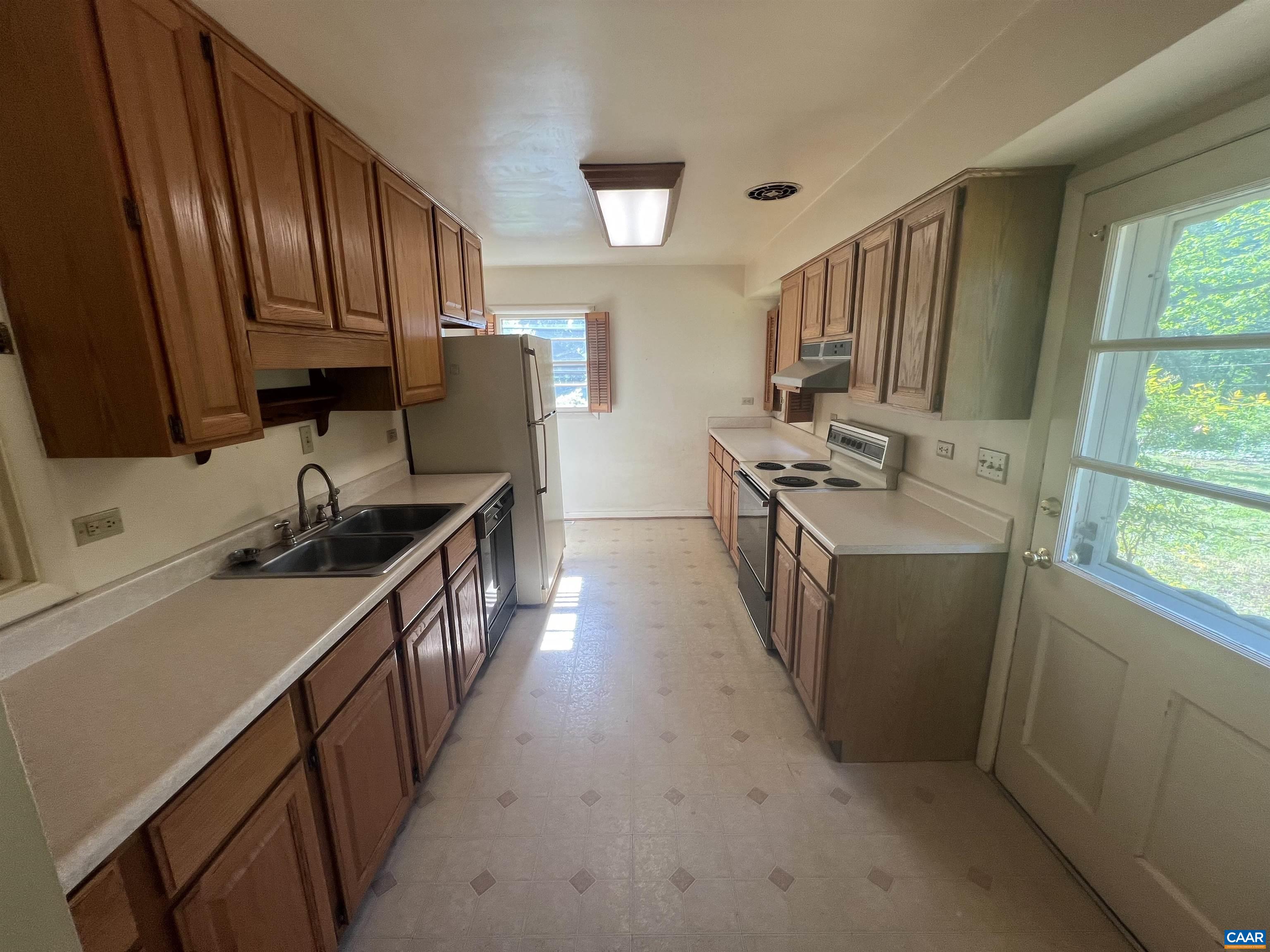 127 North Bennington Road Charlottesville, VA 22901 - Photo 16 of 29 a kitchen with stainless steel appliances a sink stove and cabinets