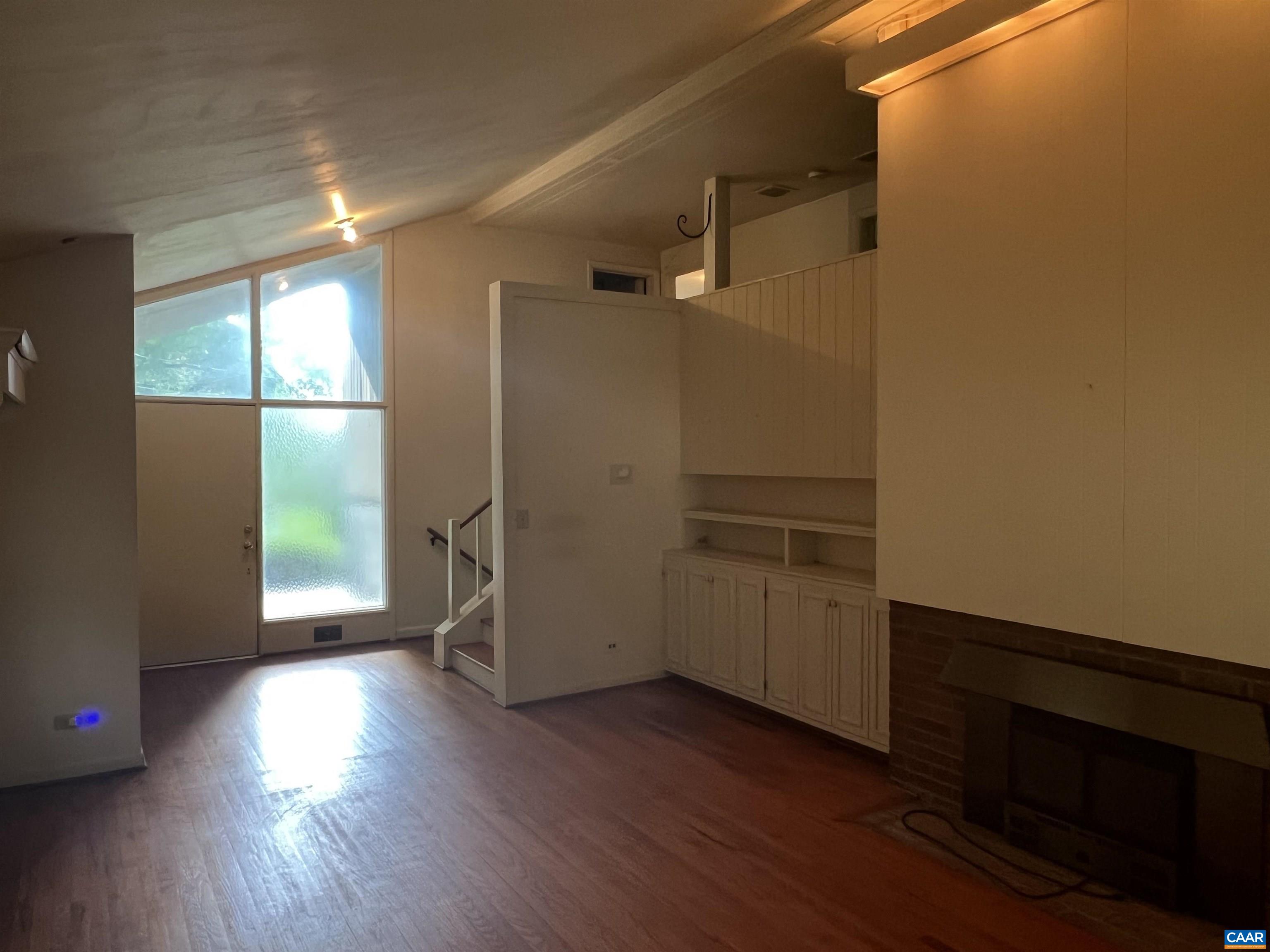 127 North Bennington Road Charlottesville, VA 22901 - Photo 3 of 29 a view of empty room with wooden floor and fan