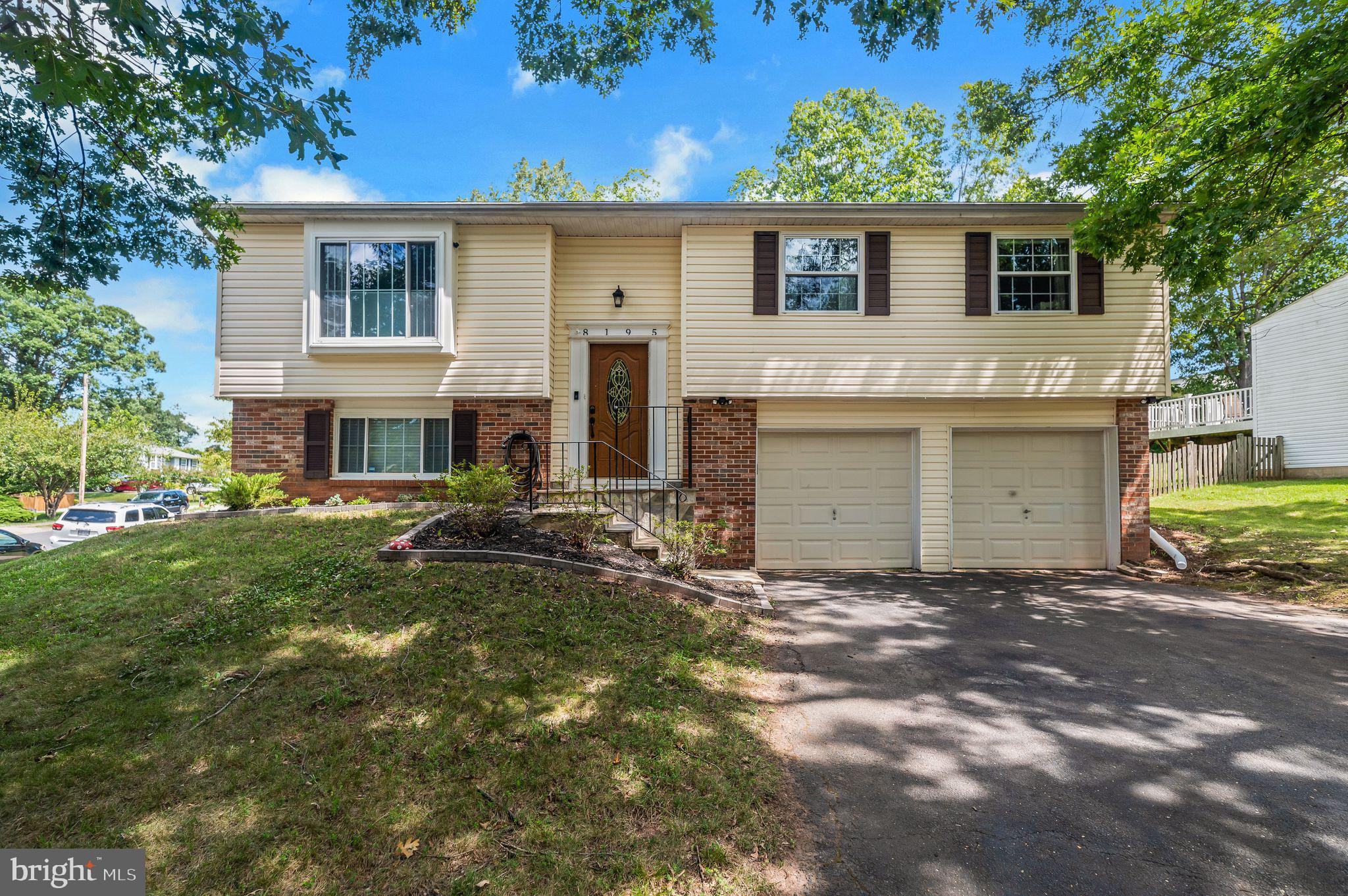 8195 Oakglen Road Manassas, VA 20110 - Photo 1 of 32 Updated Split Foyer home in Historic Manassas