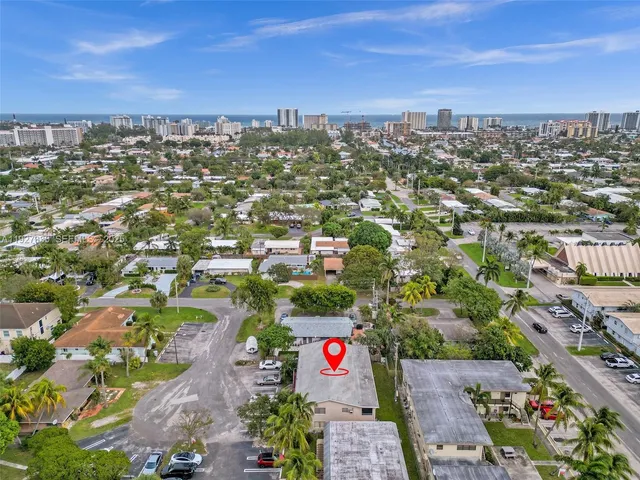 an aerial view of residential building and street