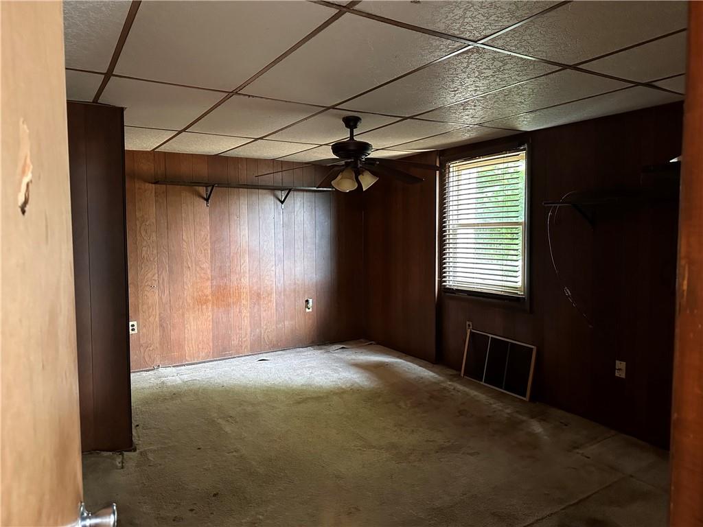 1199 Sharon Road Bridgewater, PA 15009 - Photo 15 of 15 a view of a livingroom with a ceiling fan and window