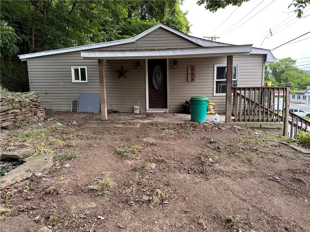 1199 Sharon Road Bridgewater, PA 15009 - Photo 3 of 15 a view of a house with a yard and wooden fence