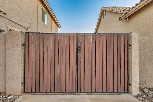 an aerial view of a house with outdoor space
