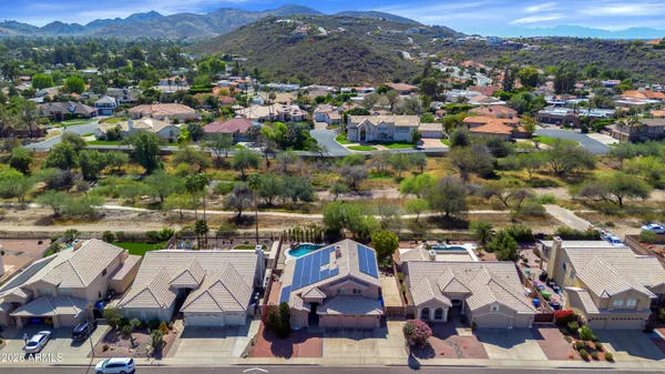 an aerial view of a city with lots of residential buildings