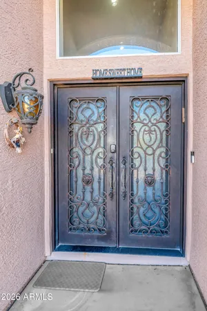 a view of a livingroom with furniture and a window