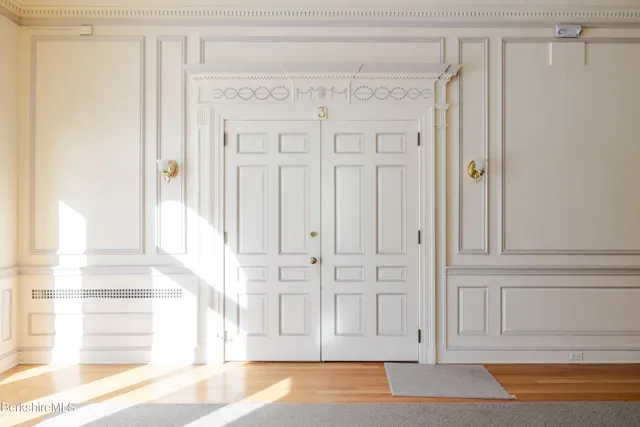 a view of a entryway with white walls