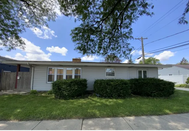 a view of outdoor space yard and front view of a house