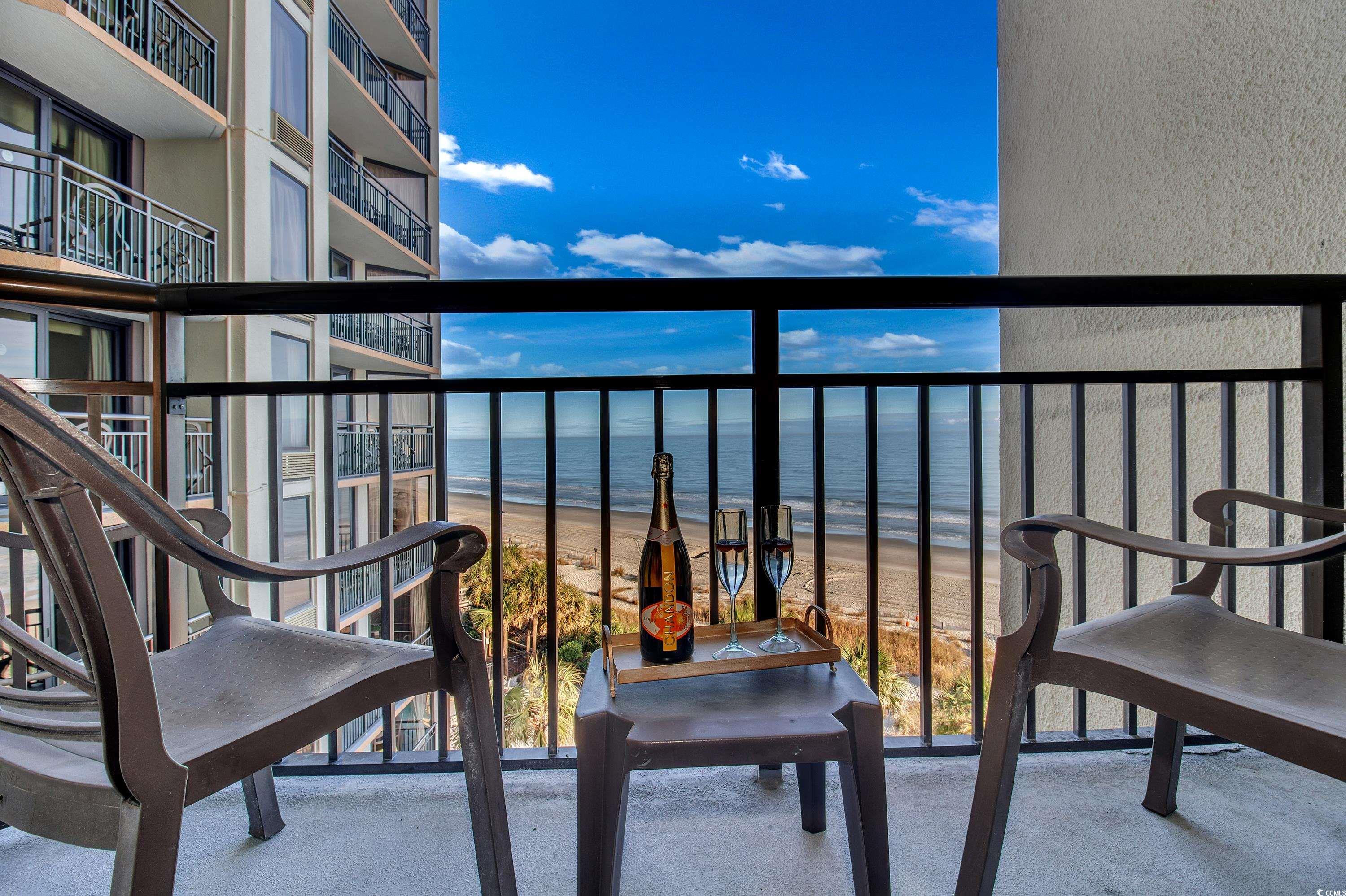 2710 North Ocean Boulevard, Unit 622 Myrtle Beach, SC 29577 - Photo 18 of 37 Balcony featuring view of water and beach